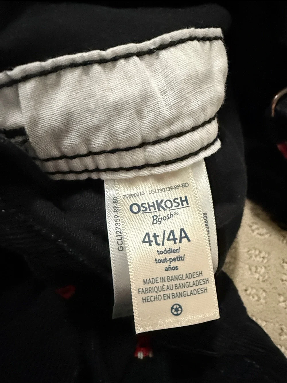 OshKosh B'gosh Black Flannel Lined Corduroy Overalls with Red Trains